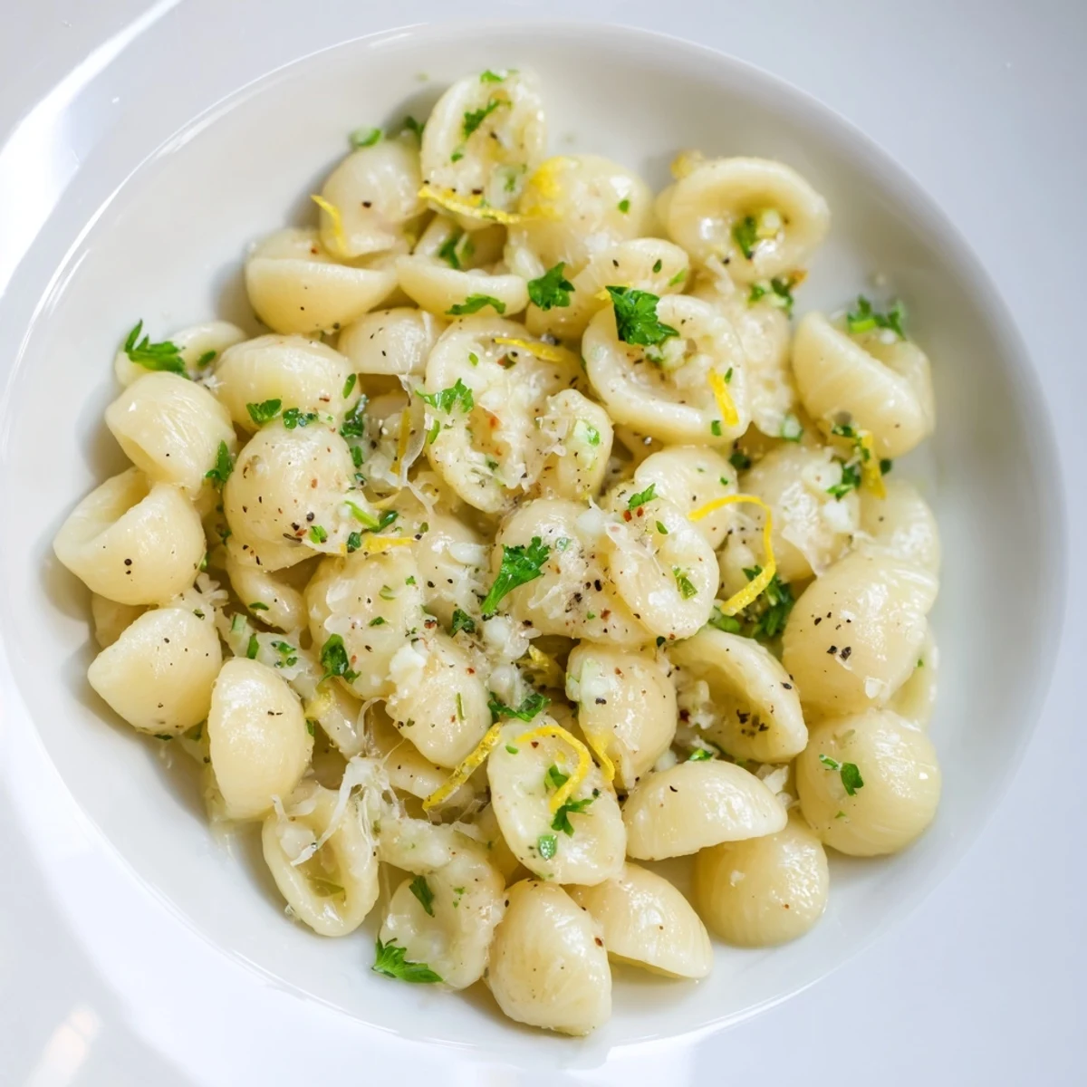 Silky garlic butter coats the ditalini pasta in this quick fifteen-minute creamy recipe.