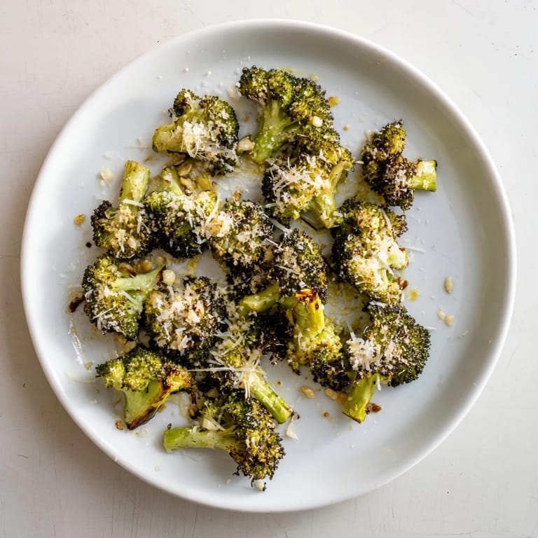 Close-up of Simple Garlic and Parmesan Roasted Broccoli: inviting aroma, perfect for dinner tonight.