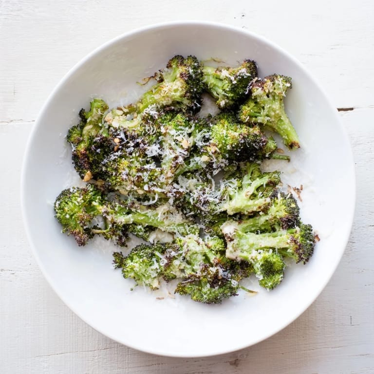 Crispy, flavorful Simple Garlic and Parmesan Roasted Broccoli; a delicious, easy vegetarian side.