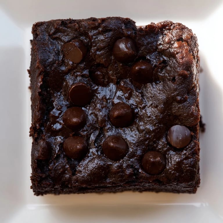 These rich and chocolatey Greek yogurt brownies are perfectly portioned for a guilt-free dessert experience.